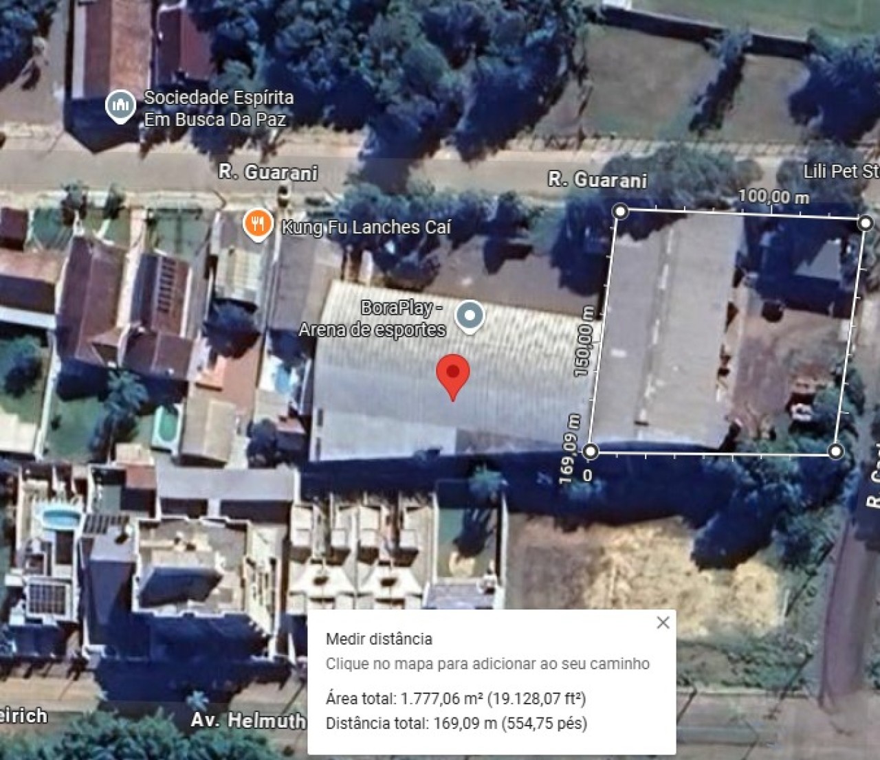 DOIS PAVILHÕES E CASA DE MADEIRA DE DOIS ANDARES SOBRE TERRENO COM ÁREA DE 3.831,74m² EM SÃO SEBASTIÃO DO CAÍ